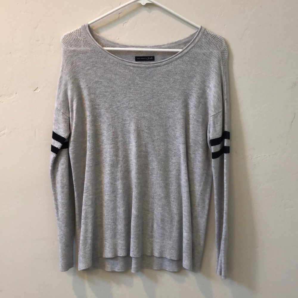 light grey sweater